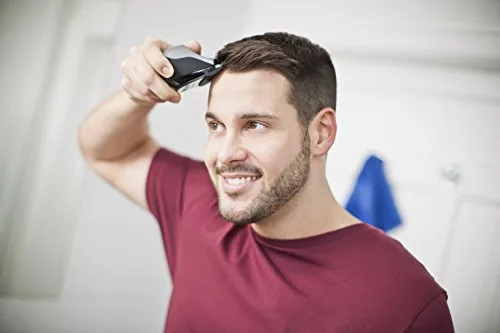 Remington ▫️ Máquina de cortar cabelo para homem com lâminas auto-afiáveis em aço inoxidável, tecnologia Curve-cut para utilização por conta própria, 0,5-15 mm, QuickCut com 9 pentes, cabo/bateria, lítio, estojo HC4250 3