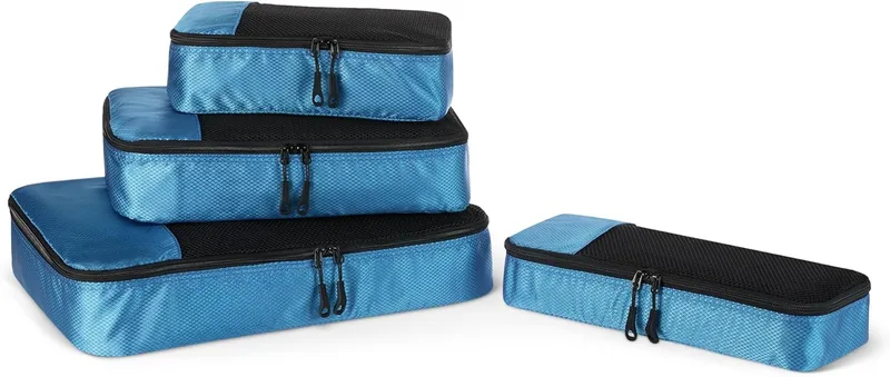 Amazon Essentials ▫️ Conjunto de 4 sacos de viagem, organizador de bagagem com fecho duplo, parte superior em malha, 100% poliéster, pequeno/médio/grande/fino, azul-celeste (anteriormente Amazon Basics)