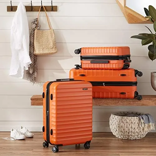 Amazon Basics ▫️ Mala Rígida Grande - Bagagem de Viagem Extensível em ABS com 4 Rodas Duplas Giratórias - Resistente a arranhões e leve - 78 x 52,6 x 32 cm - Laranja Queimado 7