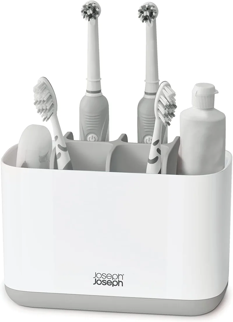 Joseph Joseph ▫️ Suporte para escova de dentes e pasta de dentes Easy-Store, compatível com escovas de dentes eléctricas e tradicionais, 6 compartimentos, arrumação de casa de banho amovível, branco/cinzento