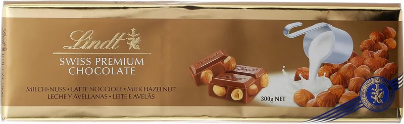 Lindt ▫️ Tableta de chocolate de leite com avelãs cremoso e suave, chocolate suíço tradicional, 300 g