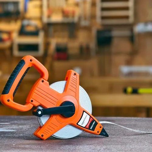 Amazon Basics ▫️ Fita métrica de fibra de vidro com carretel aberto, 30 m, escalas métricas e em polegadas, revestimento resistente a impactos, Laranja 6