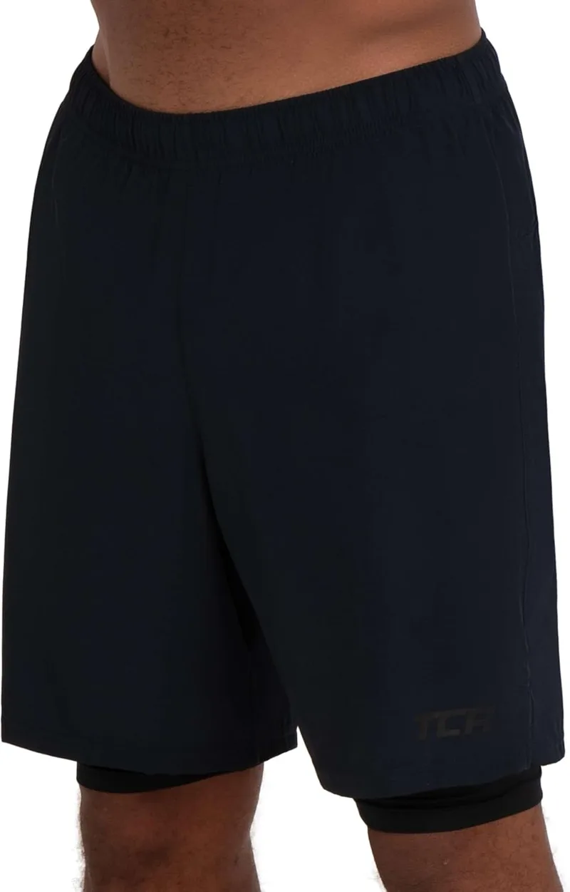 TCA ▫️ Calções desportivos de tecido para homem, com bolsos e calças interiores - Calções desportivos para homem para corrida, ginásio e padel - Modelo 2 em 1 para homem, com calças interiores curtas e bolsos com fecho de correr