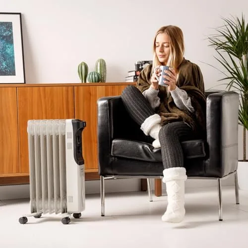 Taurus ▫️ Dakar - Radiador de óleo com 11 elementos, 2500 W, 3 níveis de potência, termóstato ajustável, proteção contra sobreaquecimento, pega e rodas, baixo consumo, luz indicadora, cinzento 2