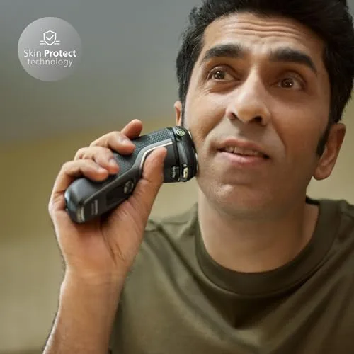 PHILIPS ▫️ Série 3000 Máquina de barbear elétrica para homem, máquina de barbear com aparador de barba, 27 lâminas, cuida da pele, 60 min de autonomia, Para uso a seco e molhado, recarregável, estojo, base de carregamento, S3342/13, preto 2