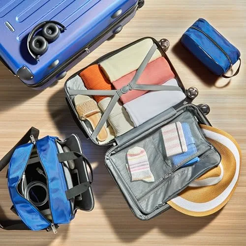 Amazon Basics ▫️ Bagagem de mão rígida com rodas, conjunto de 4 peças, mala grande, mala de mão e mala de viagem compacta, expansível, 4 rodas giratórias, azul-marinho 7