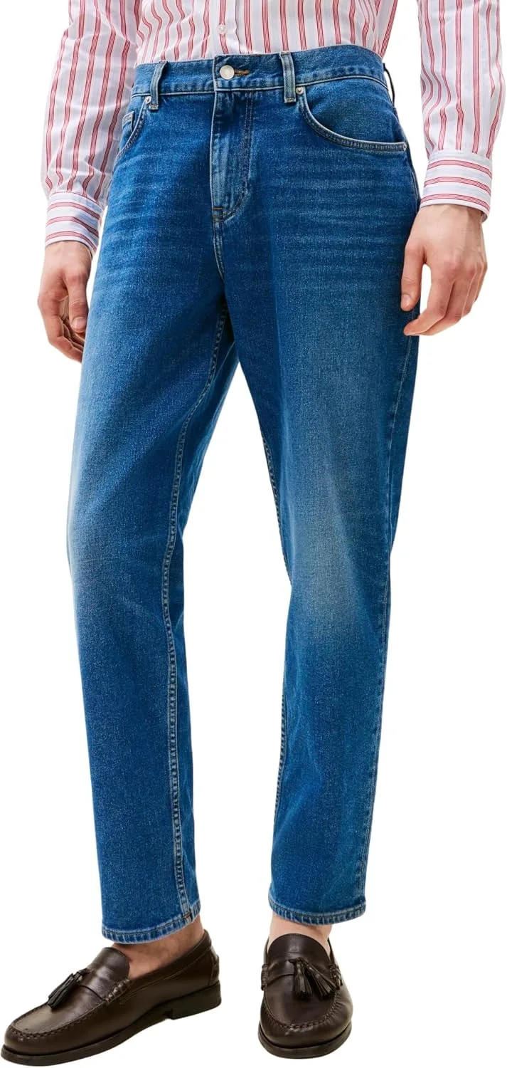 Tommy Hilfiger ▫️ Calças de ganga para homem, modelo Tapered Harlem, cintura média
