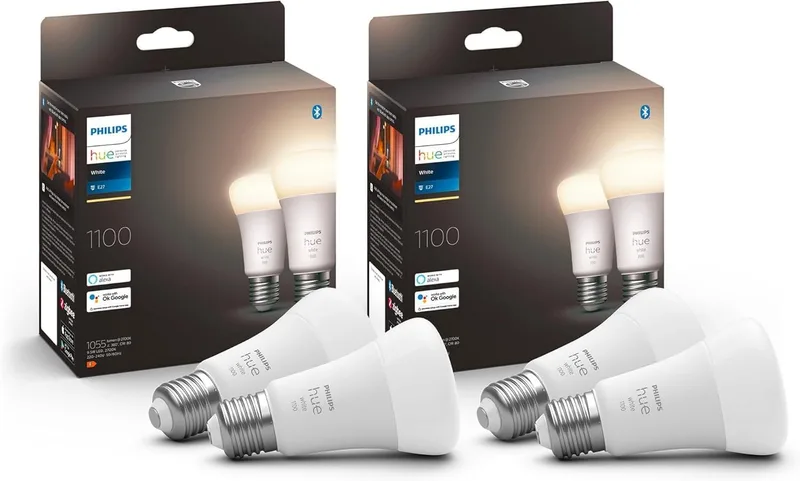 Philips Hue White - Lâmpadas LED inteligentes E27, 1055 lúmens, luz branca quente, reguláveis, controláveis por aplicação, compatíveis com Amazon Alexa, eficiência energética F, embalagem com 4 unidades