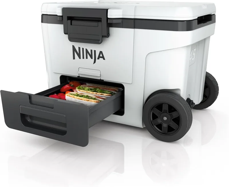 Ninja ▫️ Geleira portátil rígida FrostVault, com rodas e gaveta integrada para a zona seca com temperatura do frigorífico, retém gelo durante dias, capacidade para 68 latas, branco nuvem, FB245EUWH