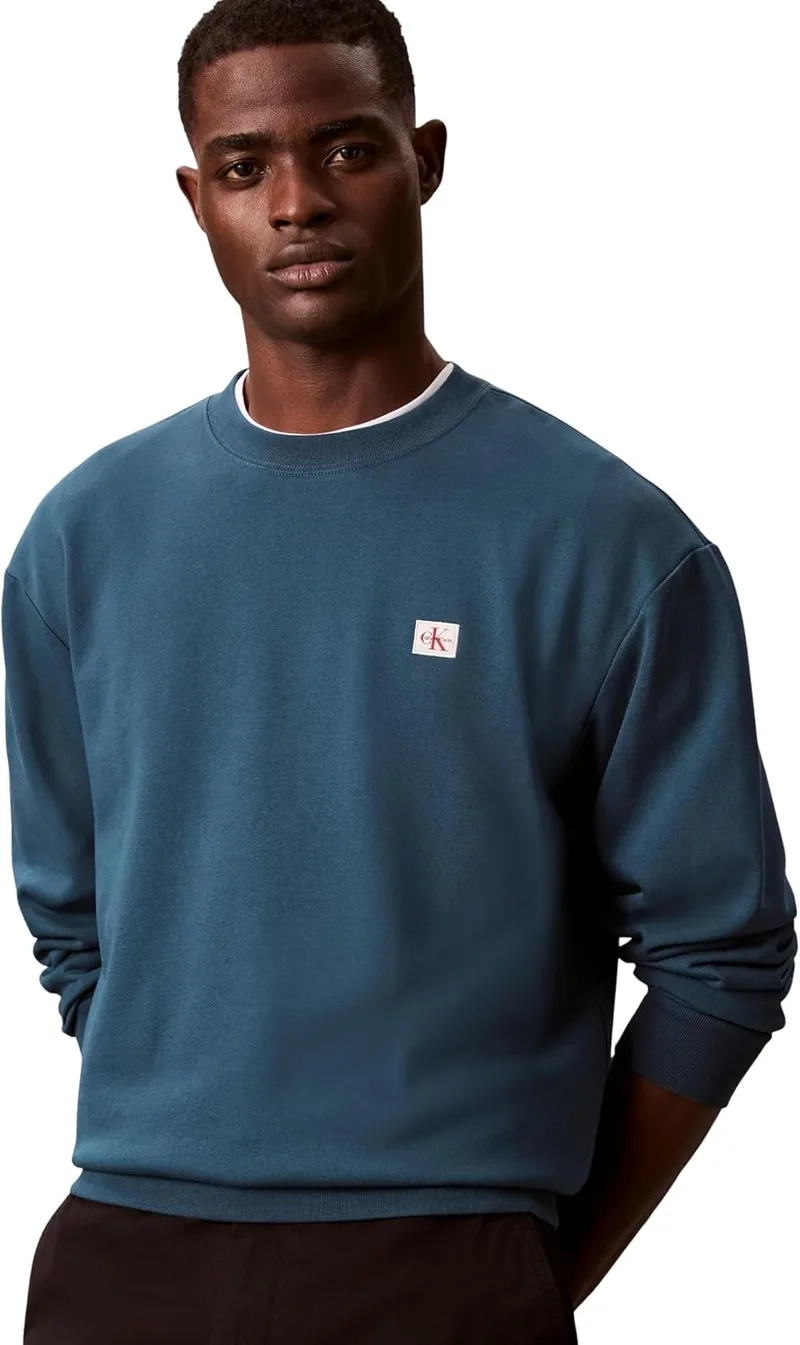 Calvin Klein ▫️ Camisola de homem em tecido felpudo com emblema e gola redonda