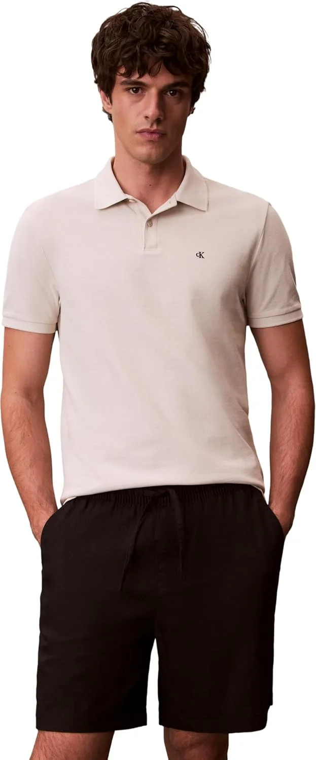Calvin Klein ▫️ Polo de manga curta para homem, com monograma, em piqué de algodão