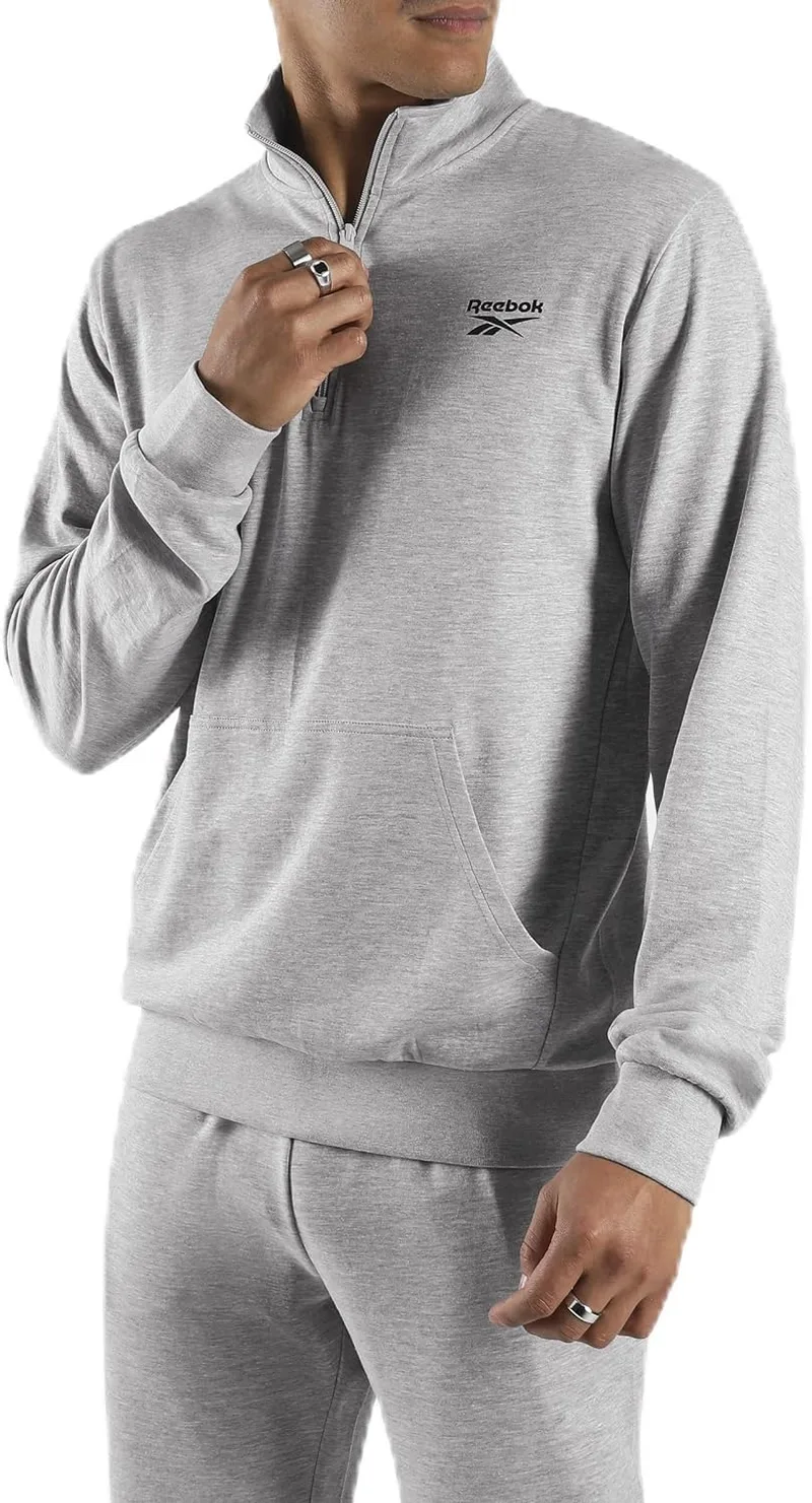 Reebok ▫️ Camisola com fecho de correr até ao quarto do comprimento e logótipo para homem