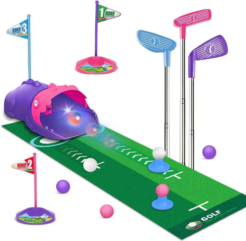 TERRAMUS ▫️ Conjunto de golfe para crianças com retorno automático de dinossauro, bolas de golfe com luz nocturna LED, 3 tacos, tapete de golfe, mini golfe para crianças dos 3 aos 8 anos, brinquedos desportivos (rosa)