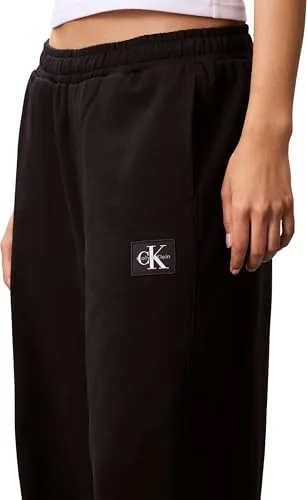 Calvin Klein ▫️ Calças de fato de treino para mulher em French Terry com emblema e logótipo, em algodão, Preto (Black), XXL 3