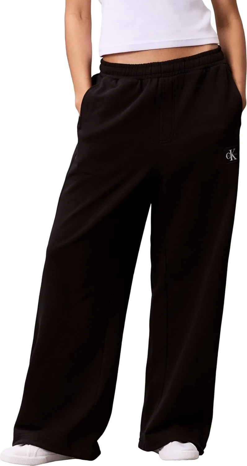 Calvin Klein ▫️ Calças de fato de treino para mulher em French Terry com emblema e logótipo, em algodão, Preto (Black), XXL